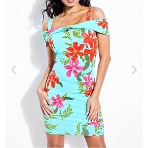 New without tags Guess dress, color aqua with red Flowers, stretchy and sexy